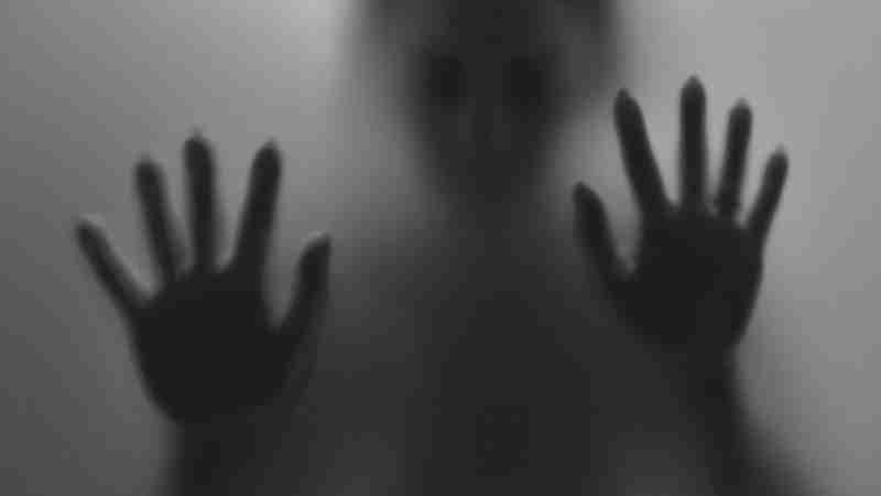 Blurred silhouette with hands pressed against frosted glass, creating a mysterious artistic effect., tags: auf - pexel